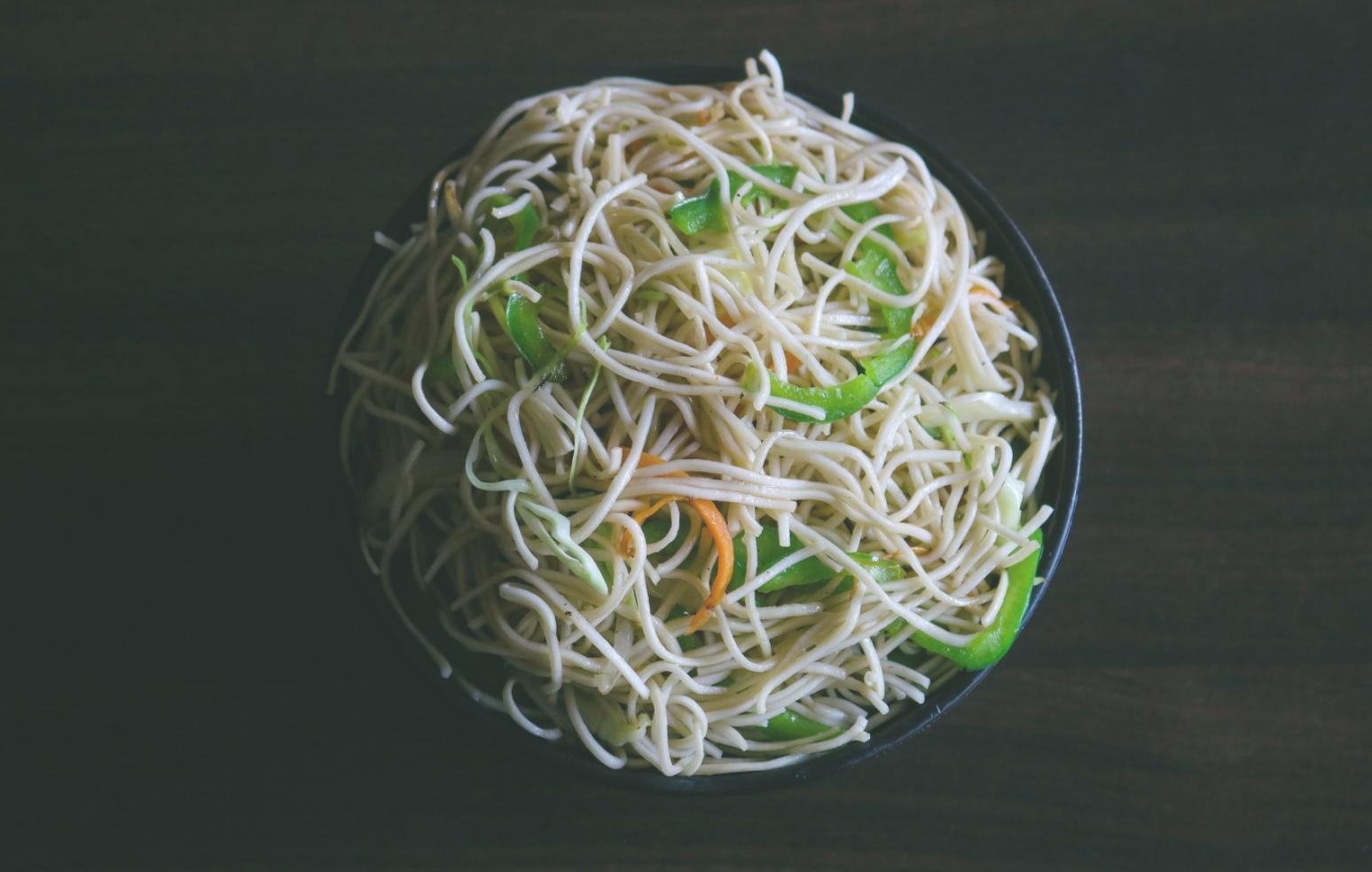 Fresh vegetables and healthy ingredients on a kitchen counter